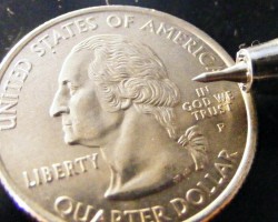Coulter Precision scribe above a quarter