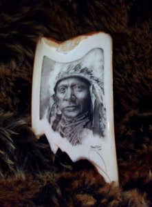 Darrel Morris' Scrimshaw of a Crow Warrior on Mammoth Ivory