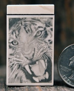 Ron Luebke scrimshaw of a tiger