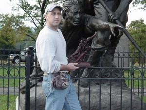 Scot Kimel in front of monument