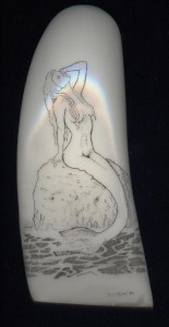 mermaid image on a synthetic whale tooth by Scot Kimel