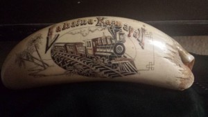 Scrimshaw Train on a sperm whale tooth from the 1970s