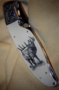 Buck on knife handle by Elizabeth Dolbare