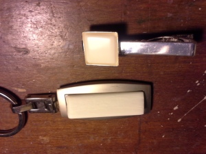 Tie Tack of "Ivory Alternative" on top, Piano key insert on keychain on the bottom