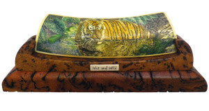 Tiger scrimshaw on display stand