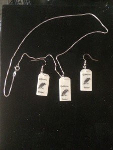 Necklace and Earrings with raven and the words: "Quoth the raven, 'Nevermore.'"