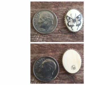 Butterfly scrimshaw on small cabochon