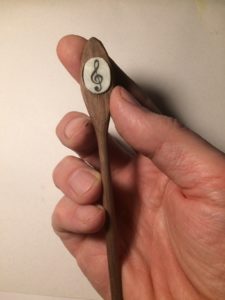 G-Clef scrimshawed into alt ivory on walnut hair stick