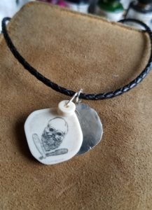 scrimshaw bearded jolly rogers by scrimshaw freeform cabochons by Cathy Grandalski