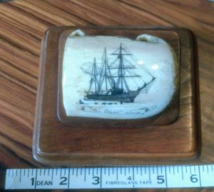 Top view of "USS Bear" scrimshaw showing loops where it was used to attach to net