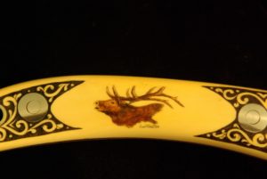 Full scrimshaw of elk with embellishments on knife handle